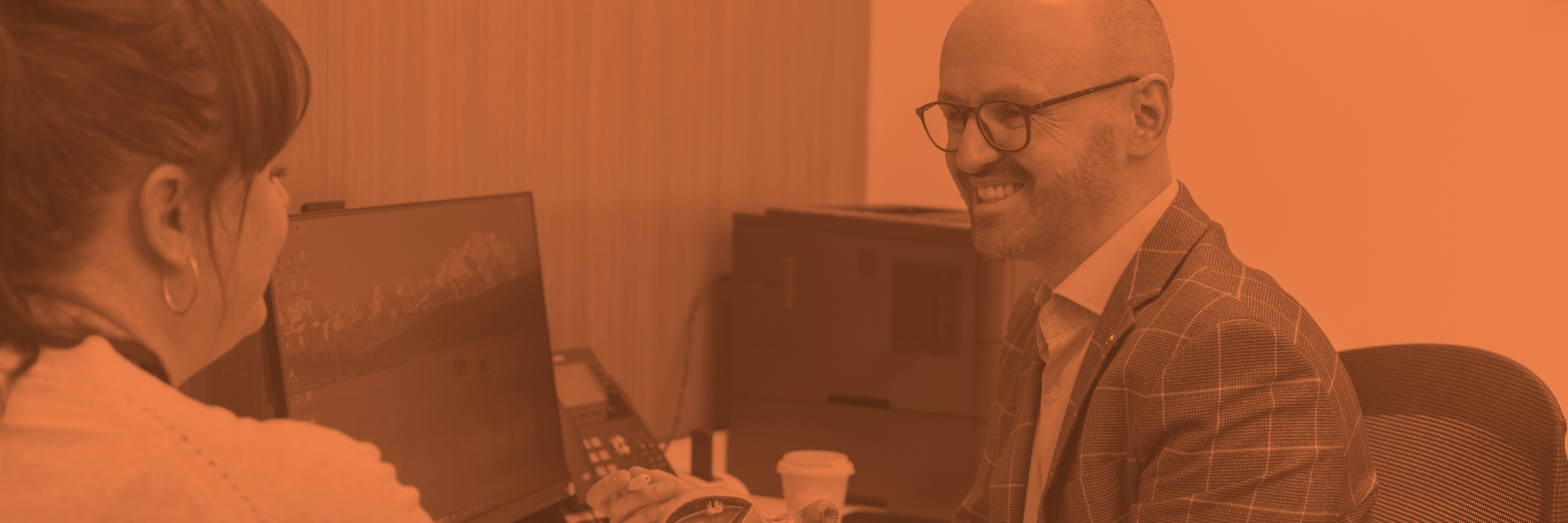 Dr Sam Holford consulting with a patient